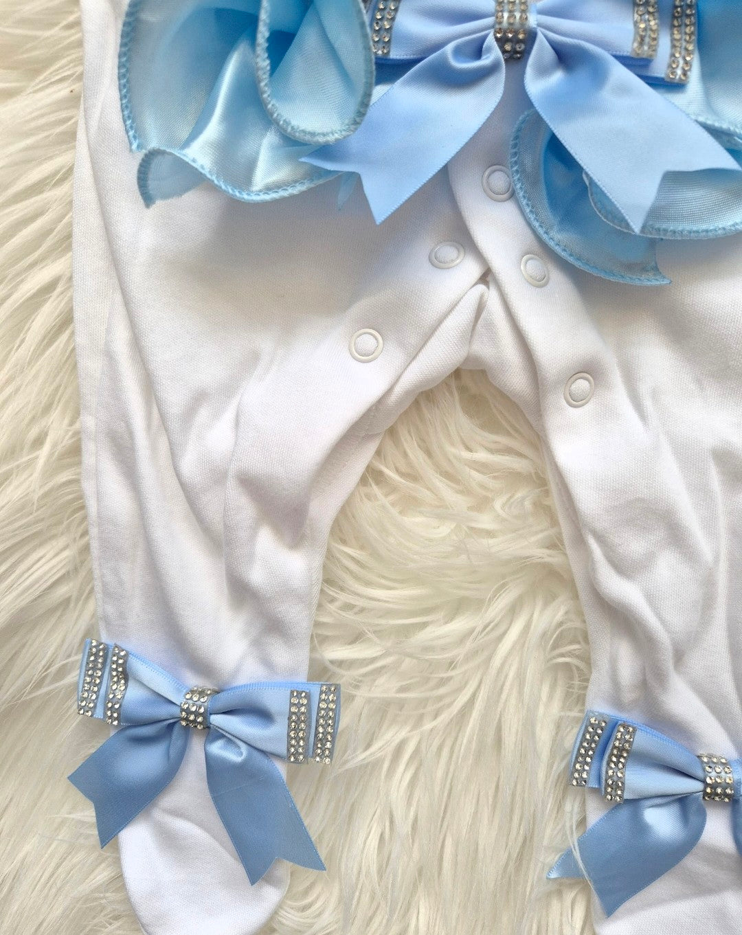 Blue ruffle babygrow