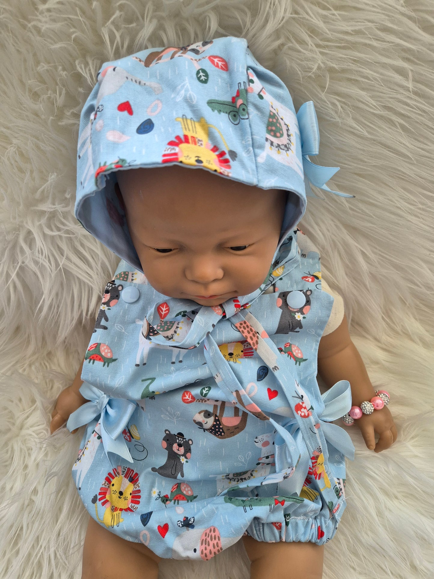 Animal print romper suit and Sun hat