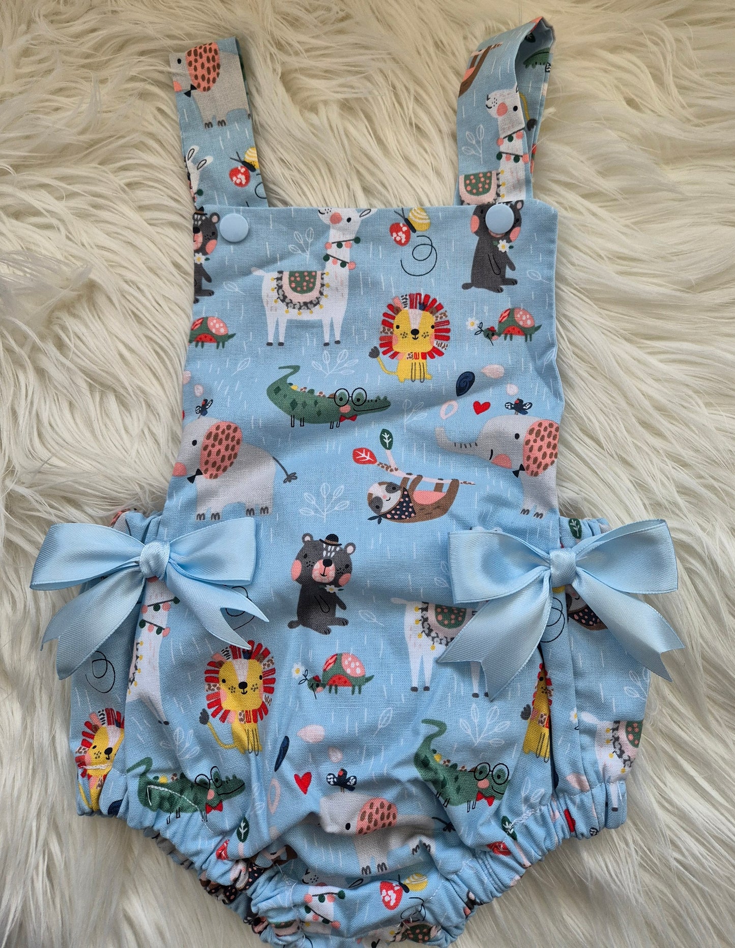 Animal print romper suit and Sun hat