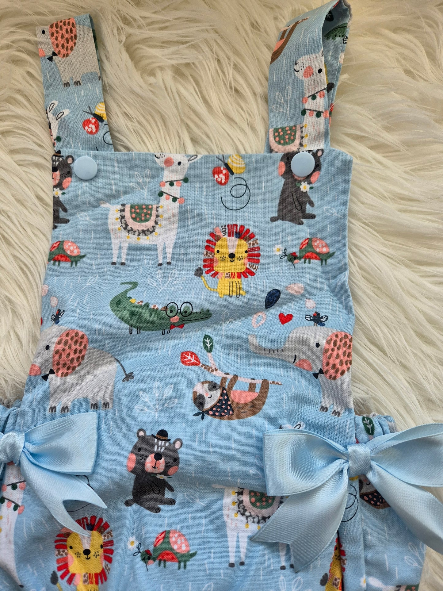 Animal print romper suit and Sun hat