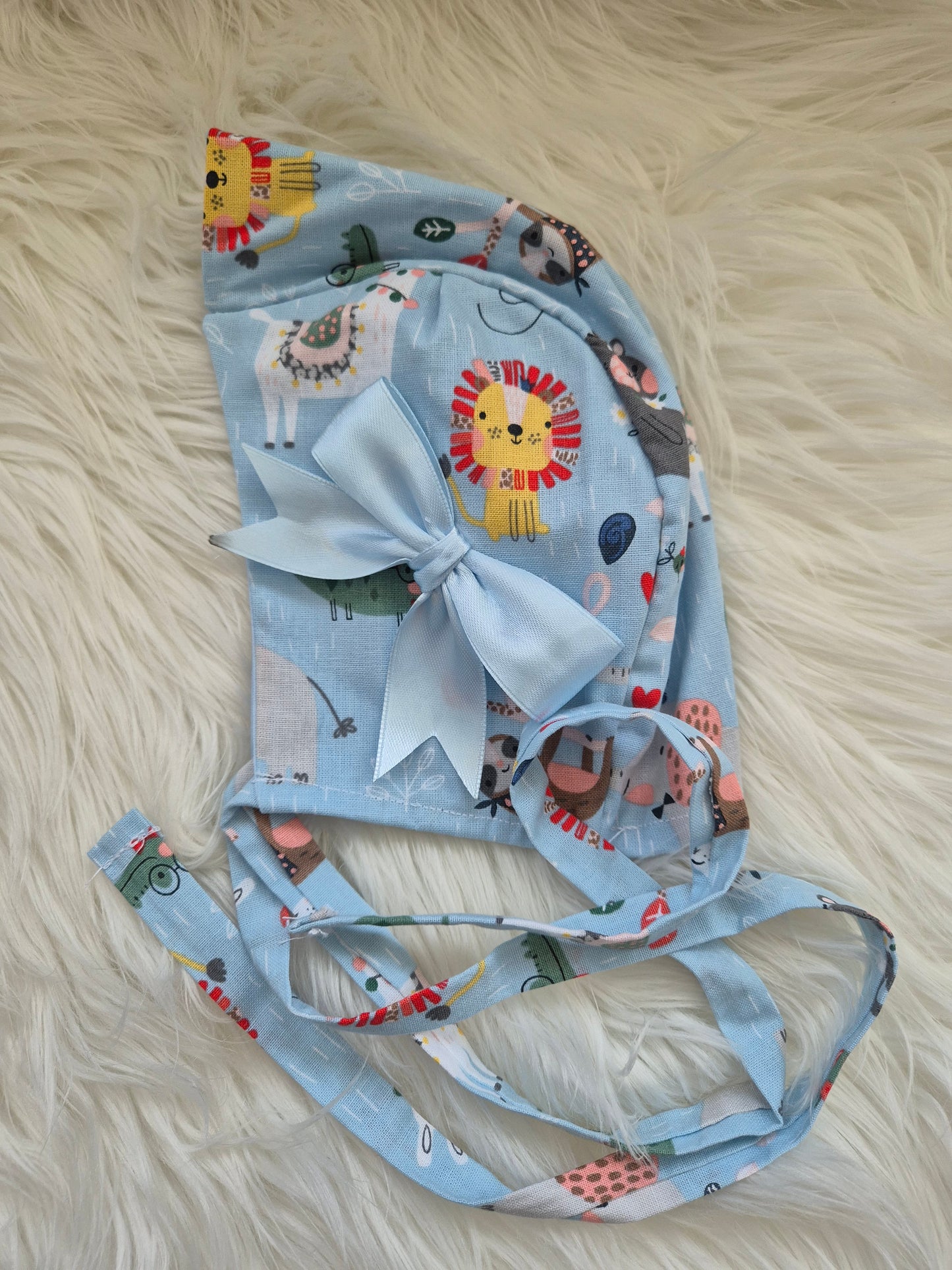 Animal print romper suit and Sun hat