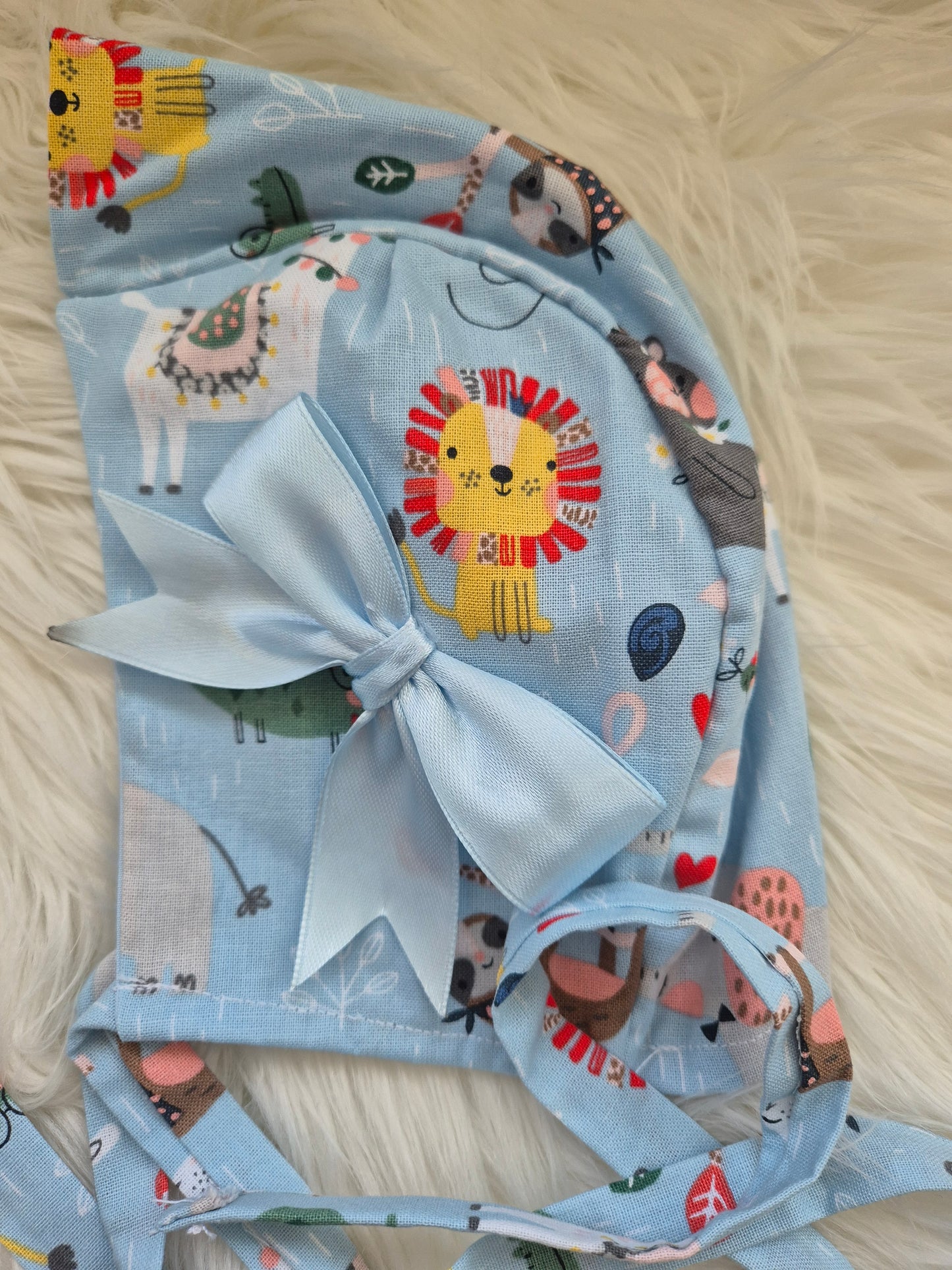 Animal print romper suit and Sun hat