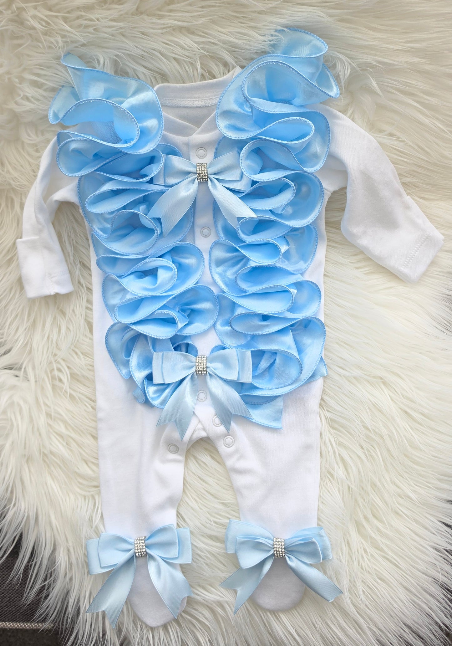 Blue ruffle babygrow