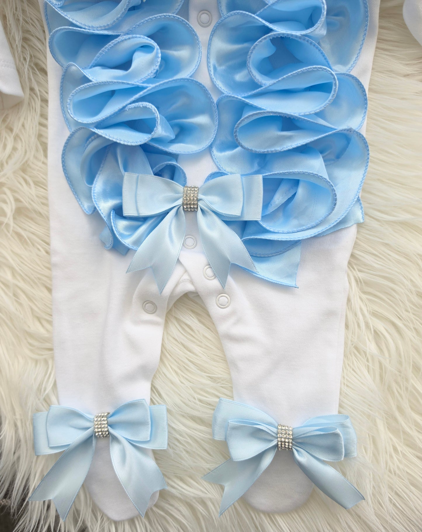Blue ruffle babygrow