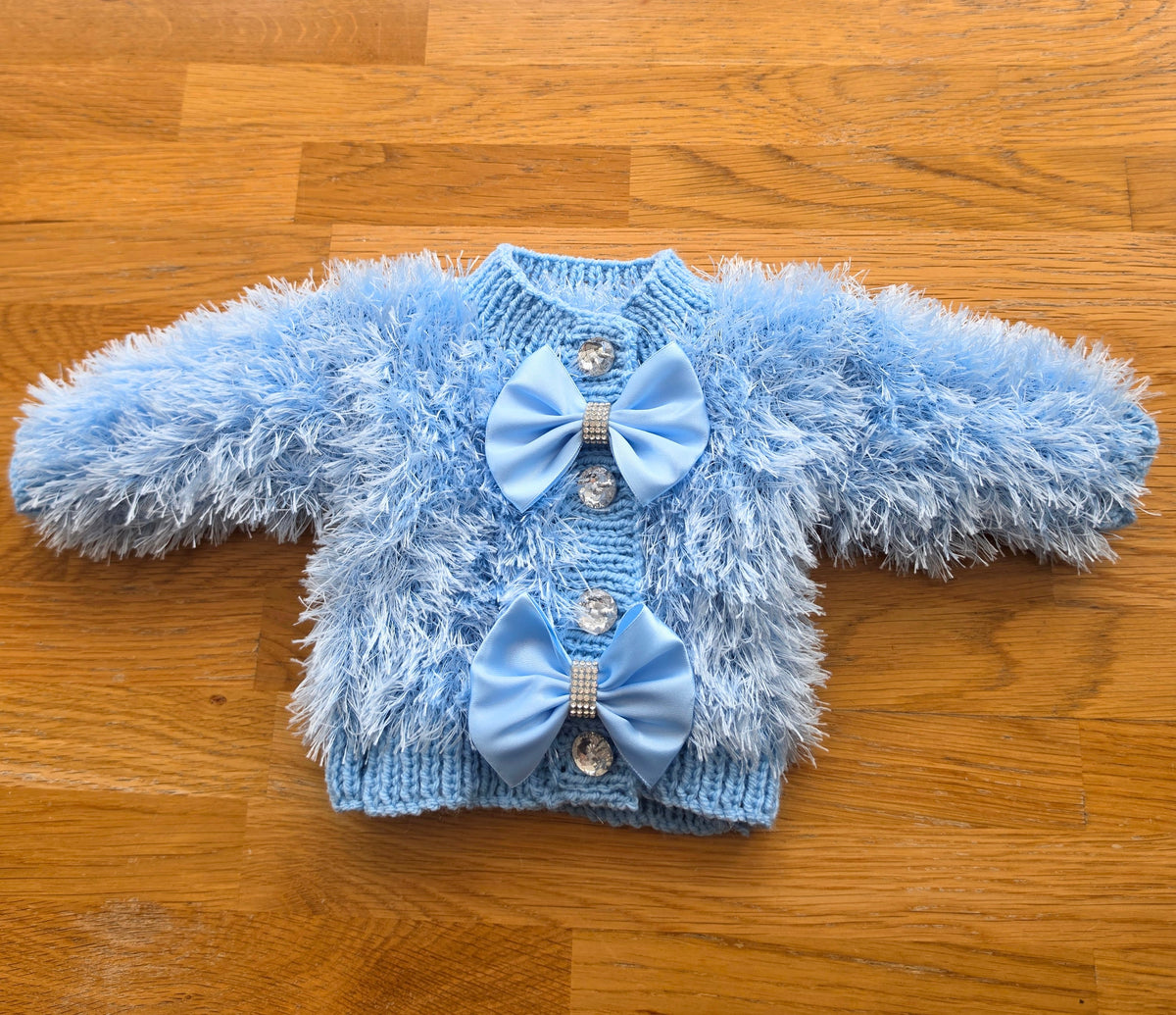 Blue furry cardigan bling bows