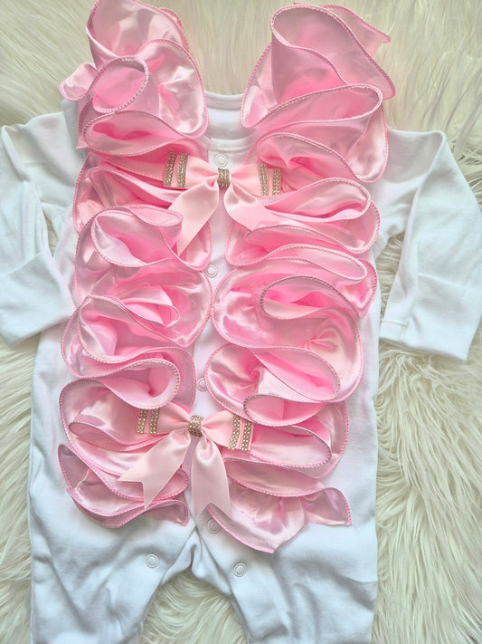 Pink ruffle front babygrow