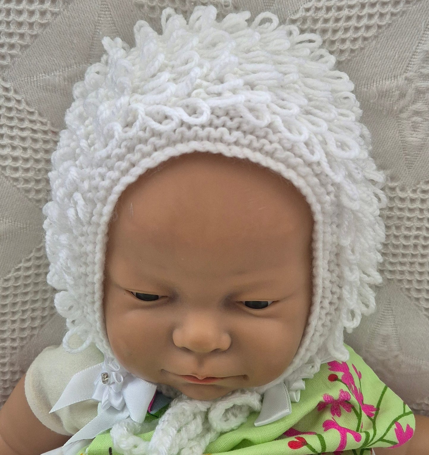 White loopy hat and booties