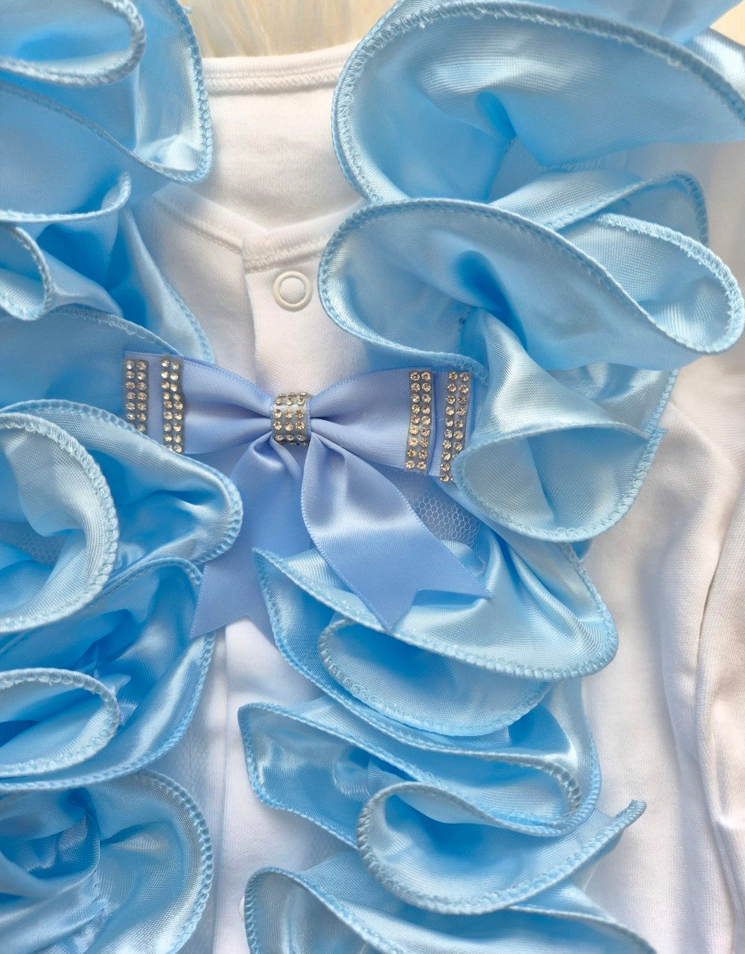 Blue ruffle babygrow