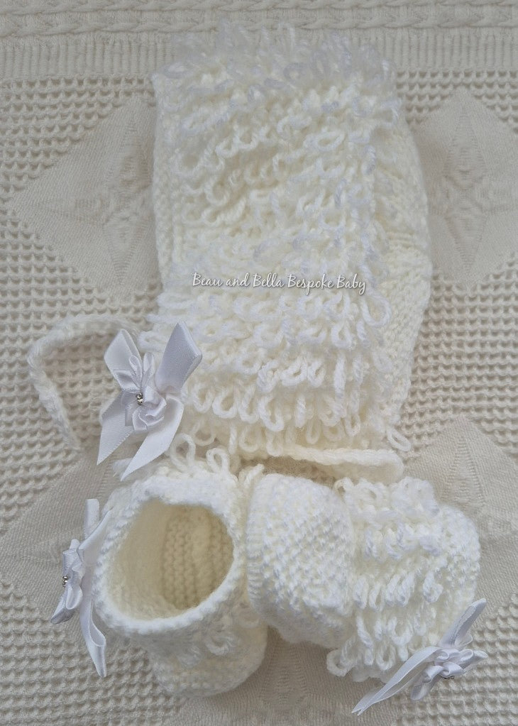 White loopy hat and booties
