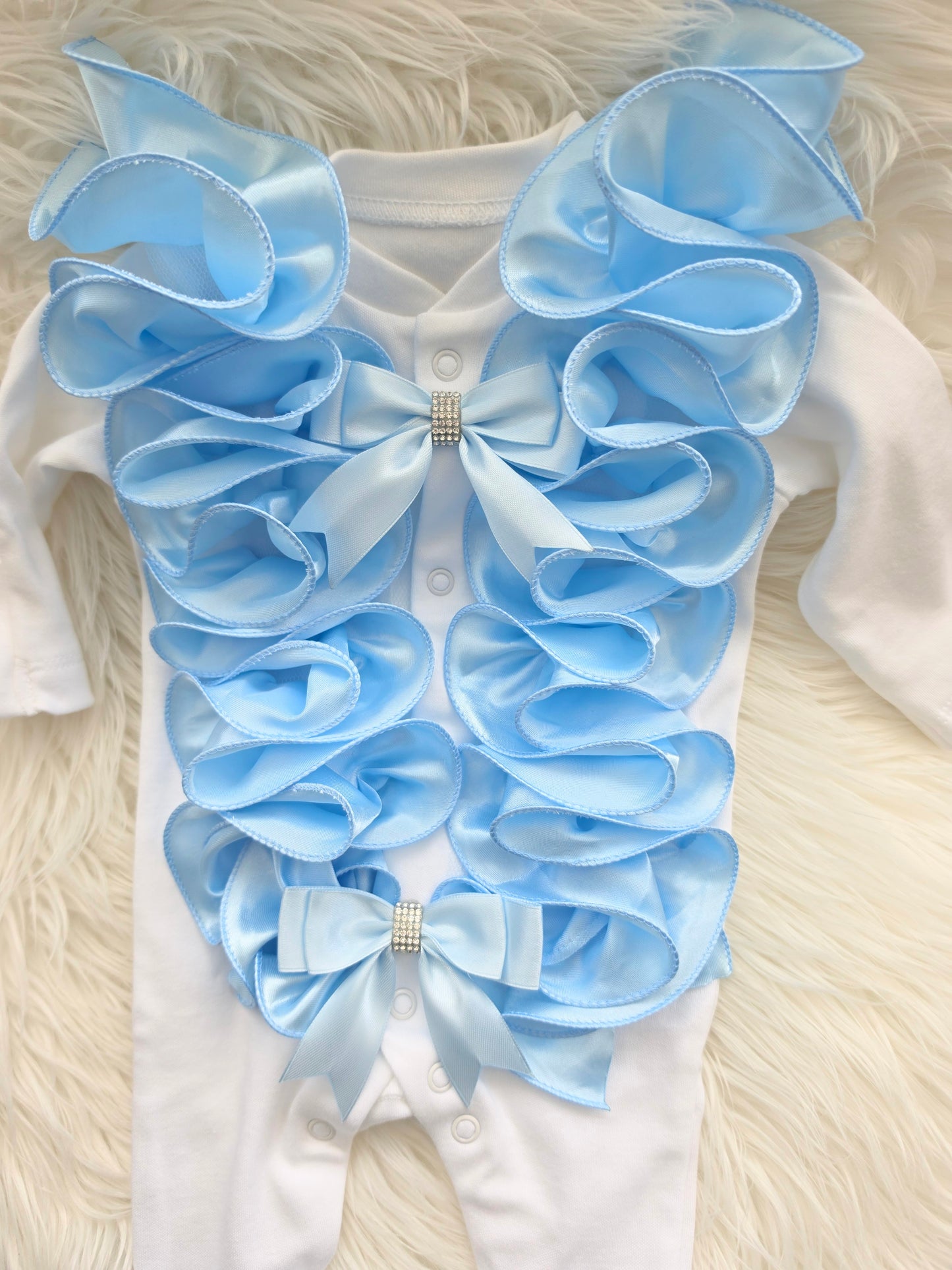 Blue ruffle babygrow