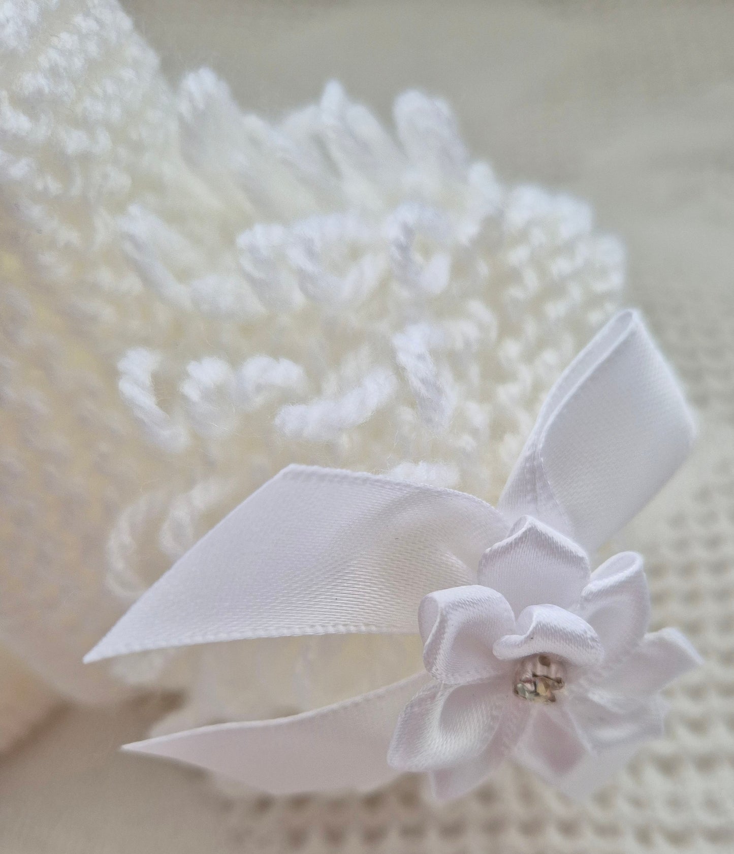 White loopy hat and booties