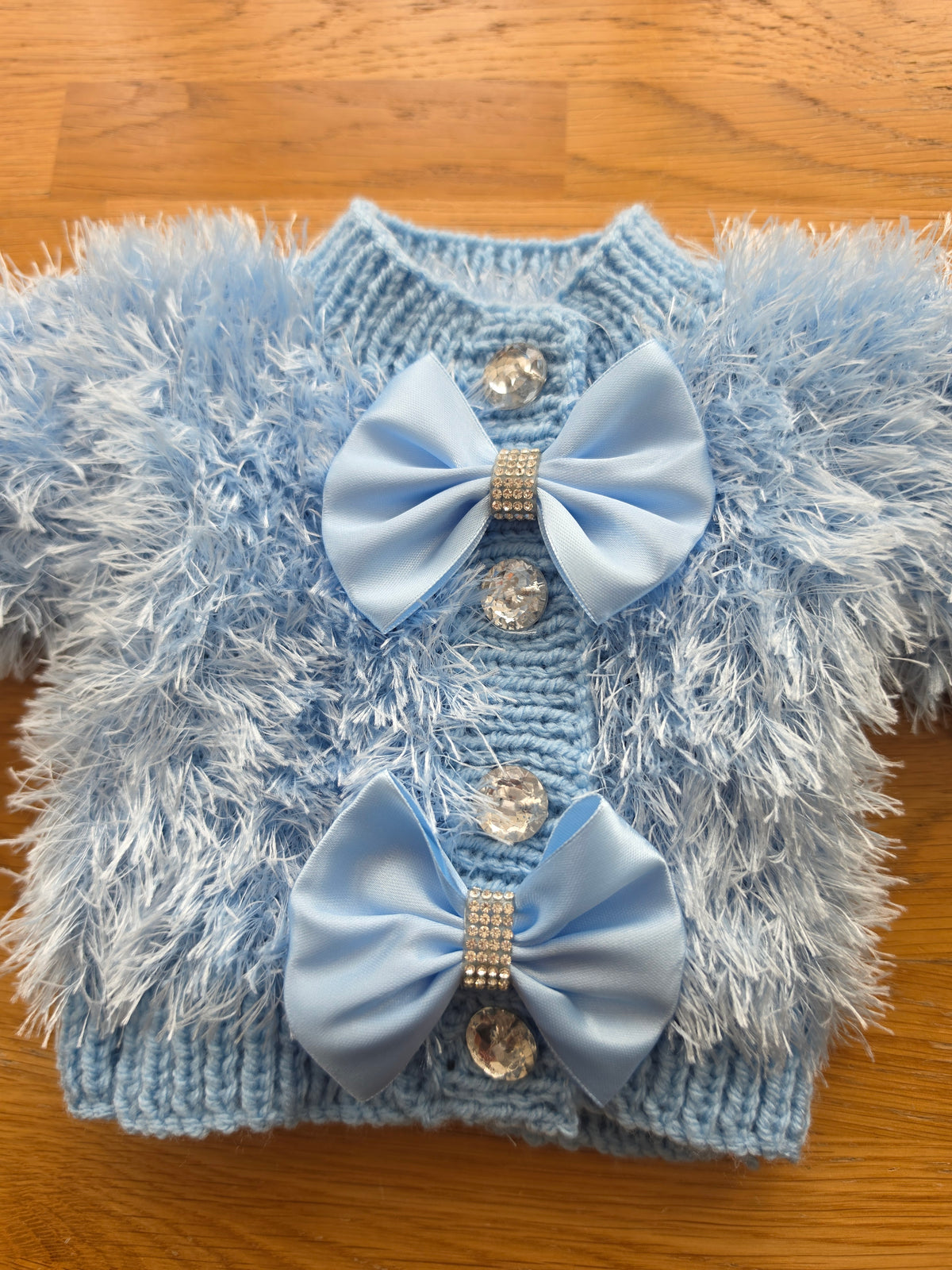 Blue furry cardigan bling bows