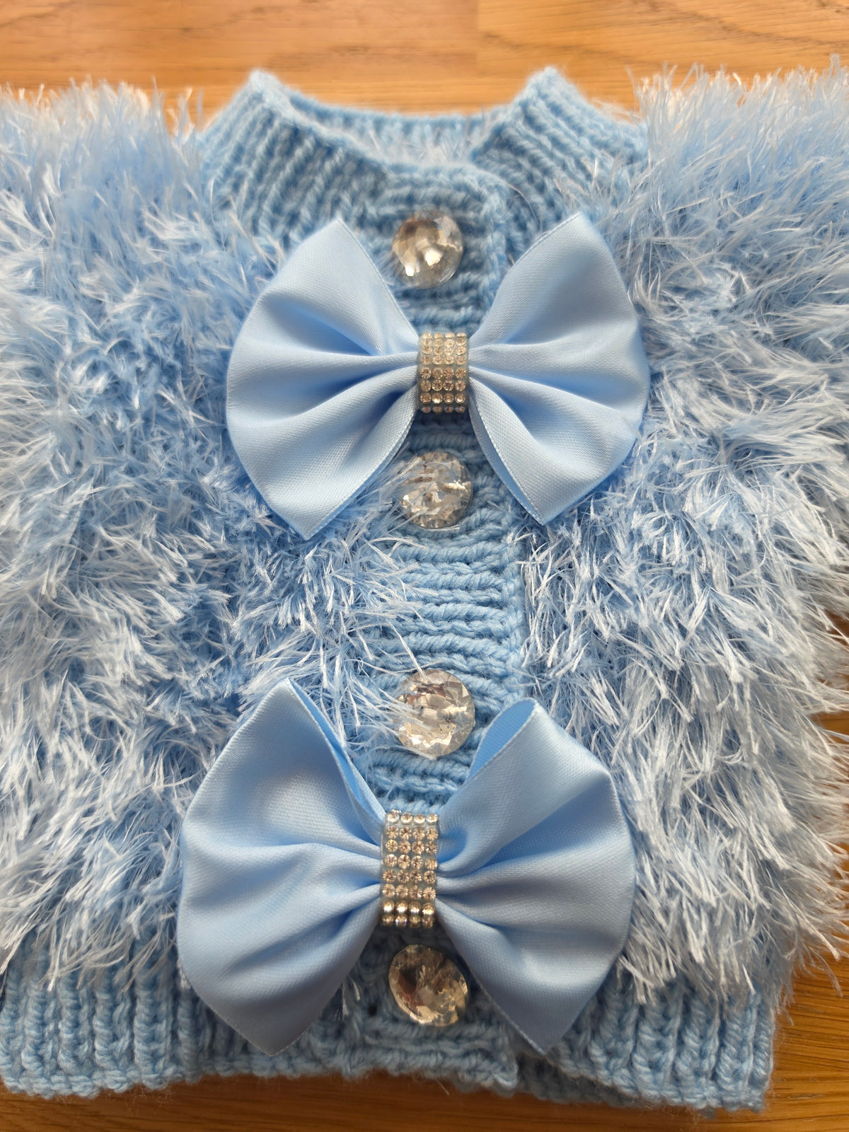 Blue furry cardigan bling bows